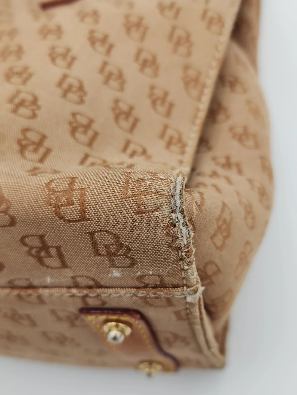 Dooney & Bourke Signature Monnogram Brown And Pink Satchel Bag‎